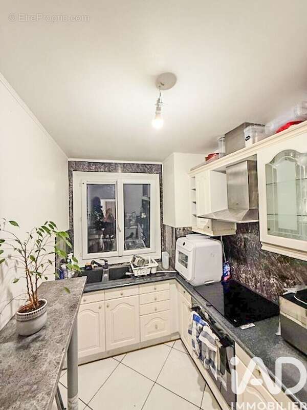 Photo 5 - Appartement à LA COURNEUVE