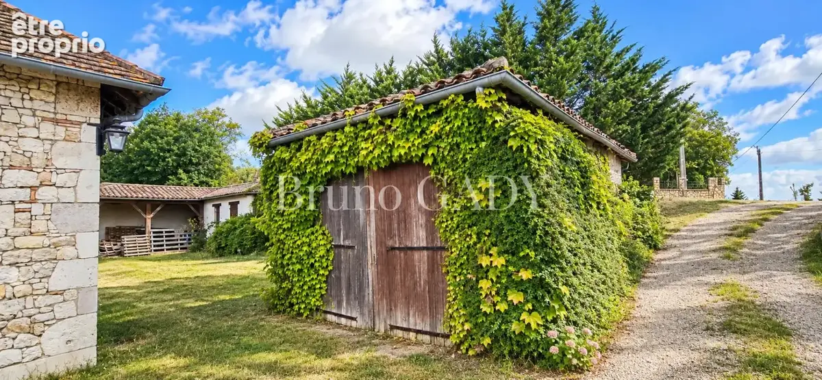 Ensemble immobilier en pierre composé de deux maison totalisant environ 262m2. sur parcelle de 13405M2 - photo 6