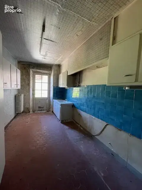 Trois logements à renover avec garages et caves - photo 11