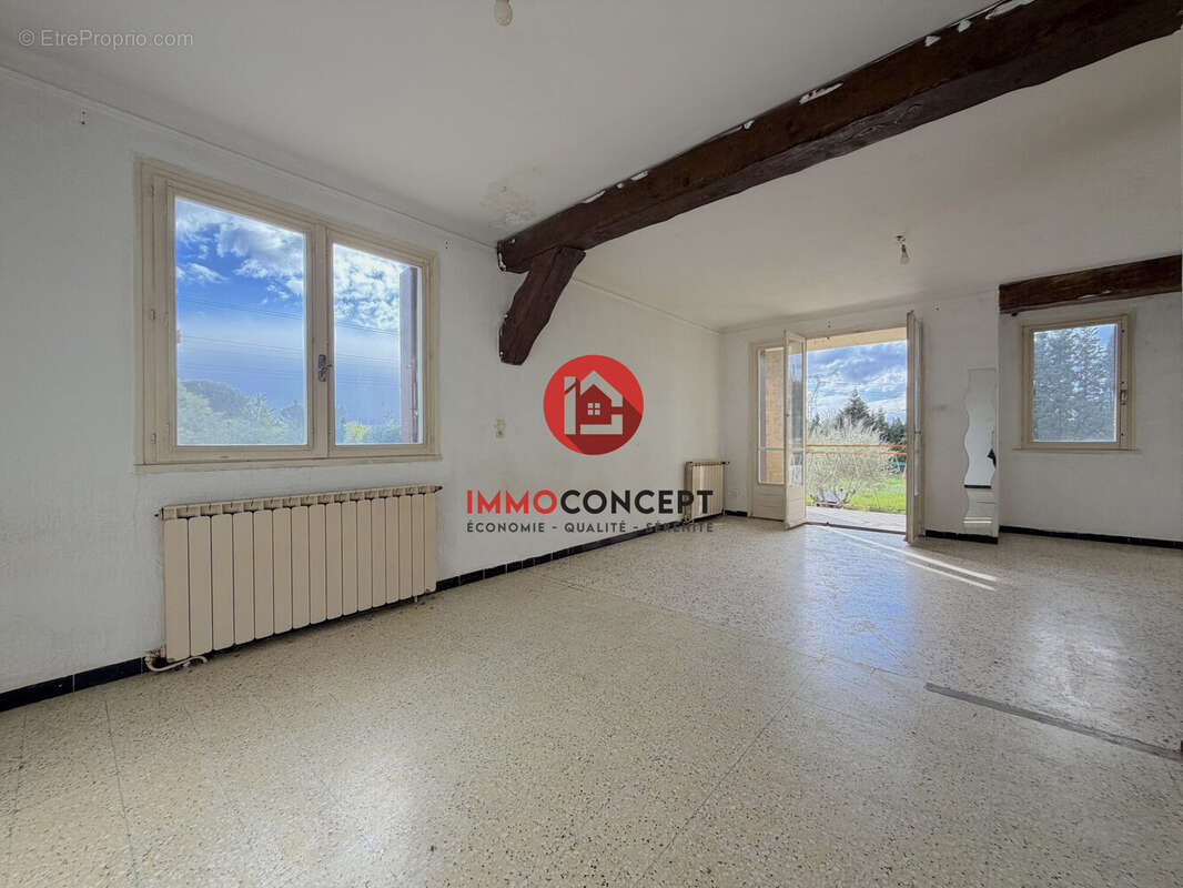 Maison à LAUDUN-L'ARDOISE