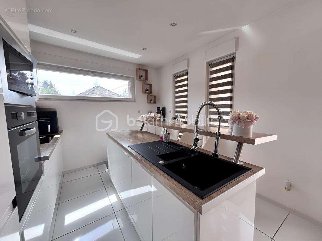 Maison à DOUCHY-LES-MINES