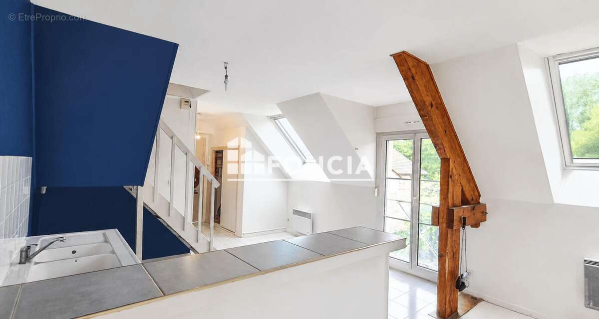 CHÂTEAU-THIERRY – Duplex T4 avec parking sécurisé et cave - photo 3