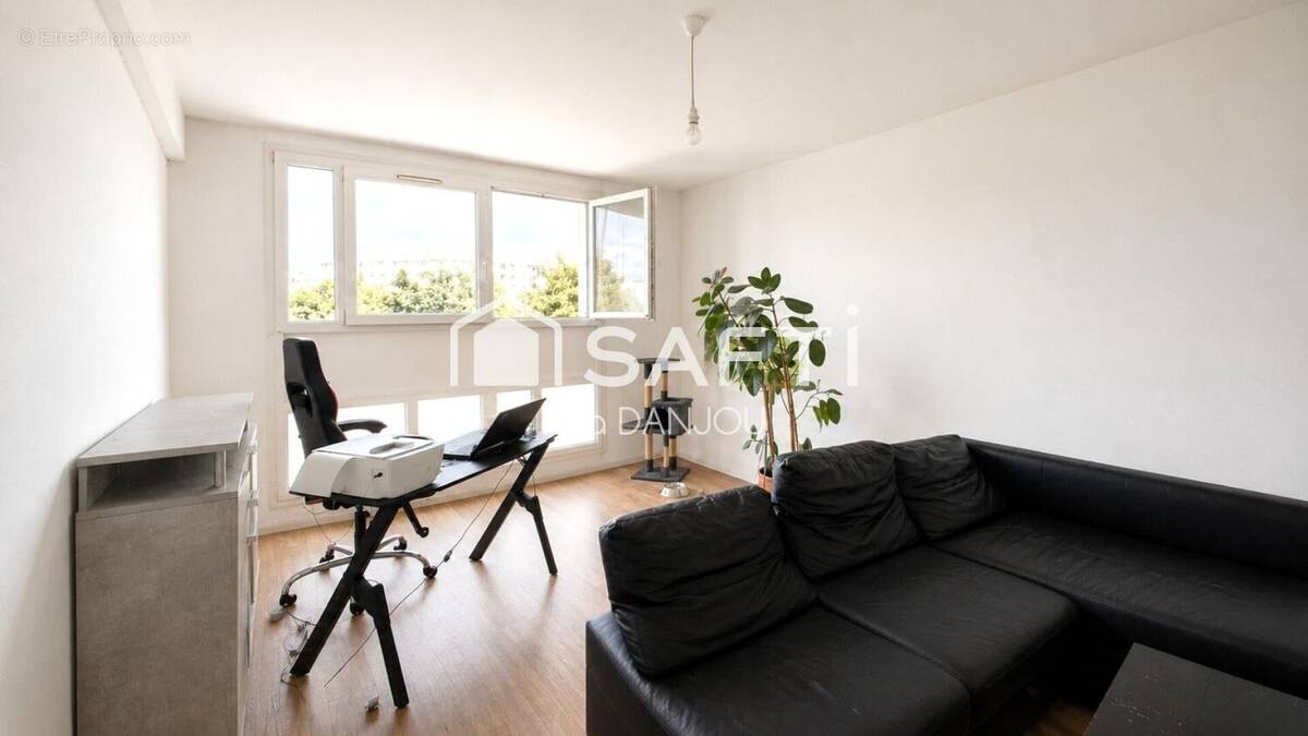 Photo 1 - Appartement à HEROUVILLE-SAINT-CLAIR