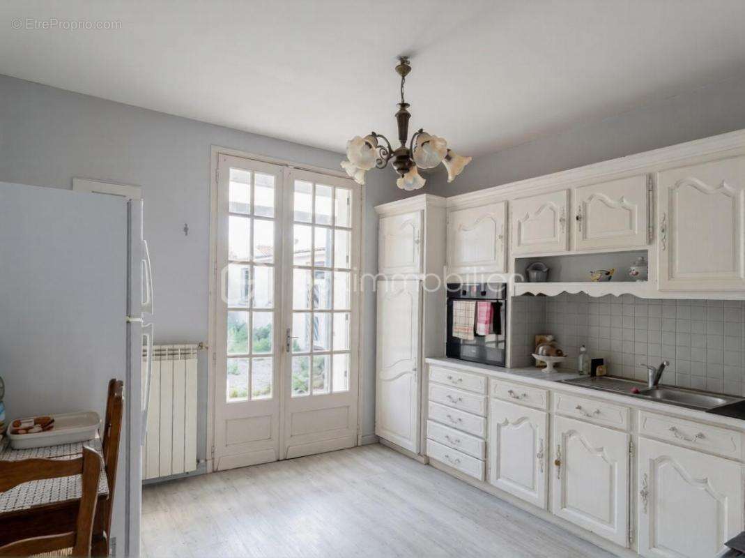 Maison à MARENNES