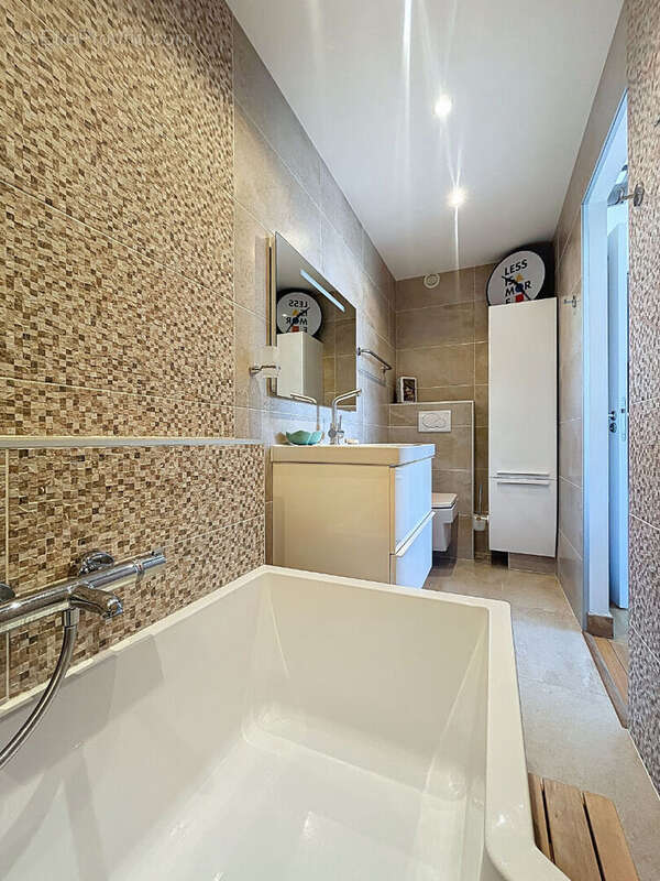 Appartement T4 95 m² rénové au coeur du Triangle d'Or d'Annecy - photo 16