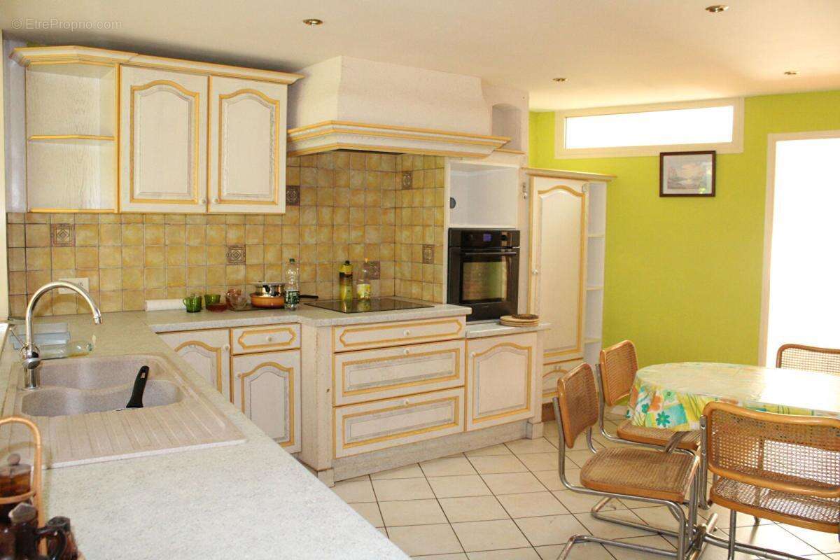 Maison avec local commercial et double garage de 66 m² - photo 2