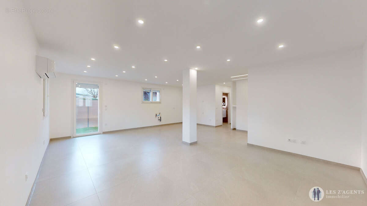T4 récent rez-de-jardin de 100m2 - photo 5