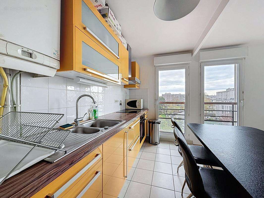 Appartement T3 lumineux avec balcon, box et cave - photo 3