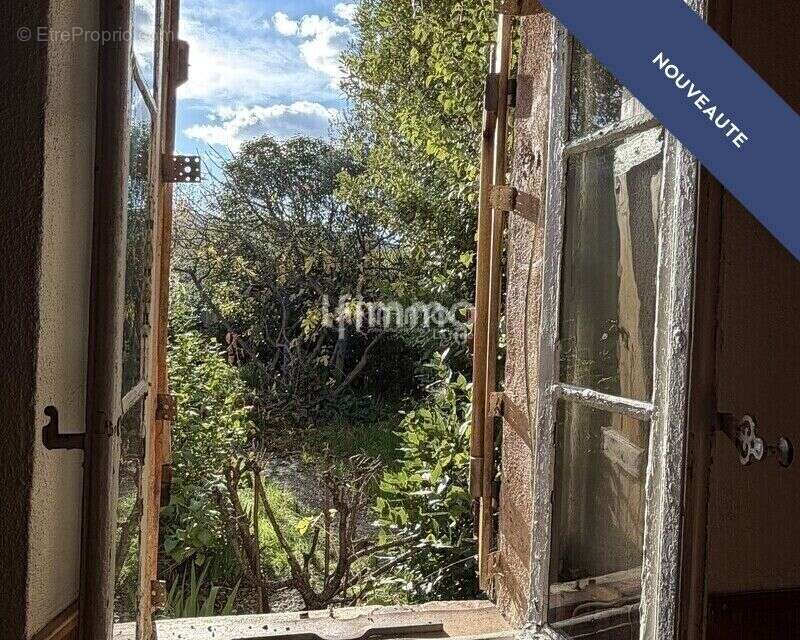 Maison entièrement à rénover + garage et jardin de plus de 200m2 - photo 5