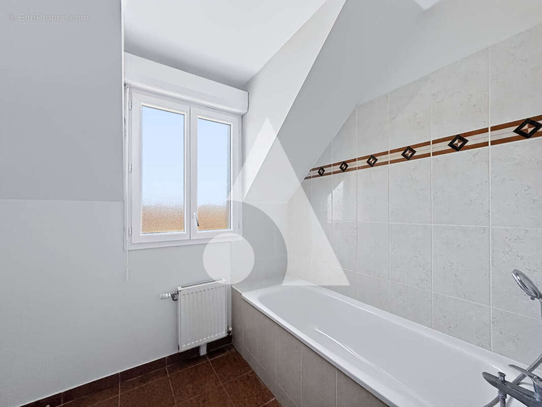 Maison avec sous-sol total et garage double à Frépillon 6 pièce(s) 128.1 m2 - photo 12