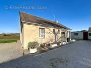 Maison à LES MOITIERS-D'ALLONNE