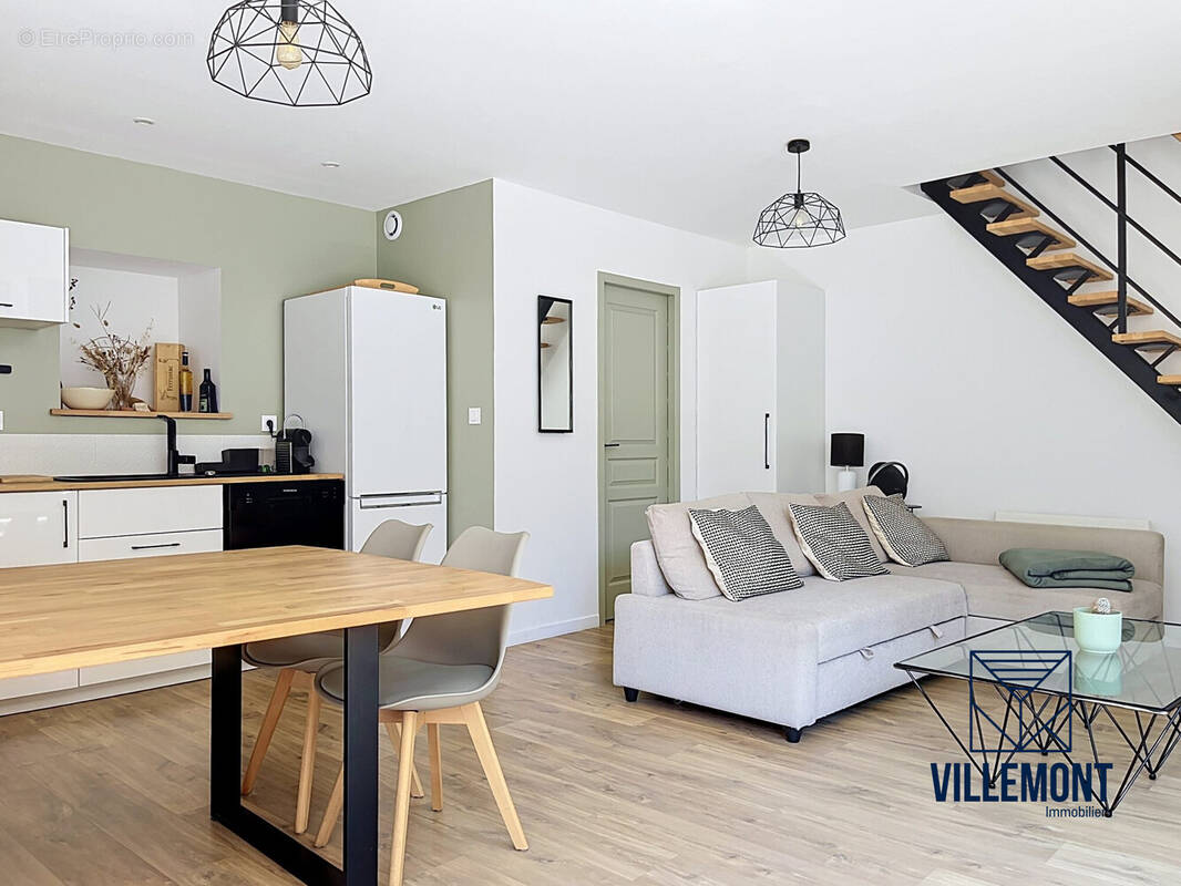 Pièce de vie - Appartement à COURNONSEC
