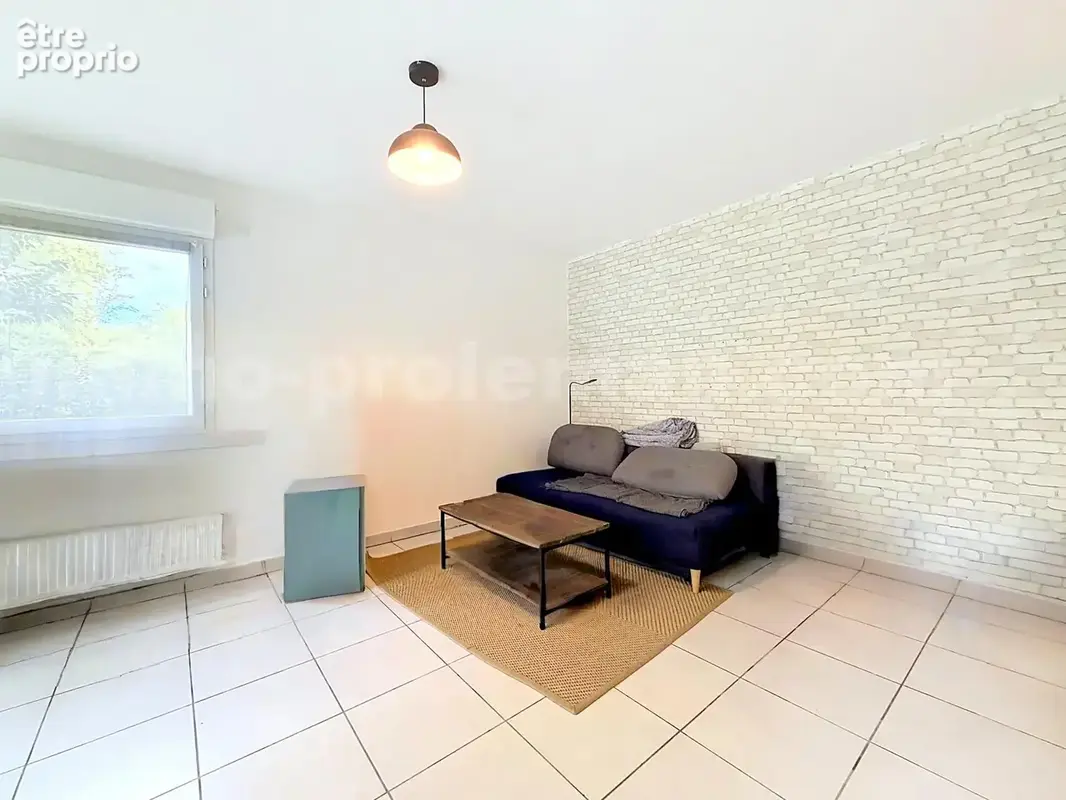 Appartement_T2_vetraz-Monthoux_CENTRE_secteur_calme_verdoyant_CEVA_frontière_SUISSE_Geneve_IMMOBILLIER_investissement_jardin_salon_cuisine_