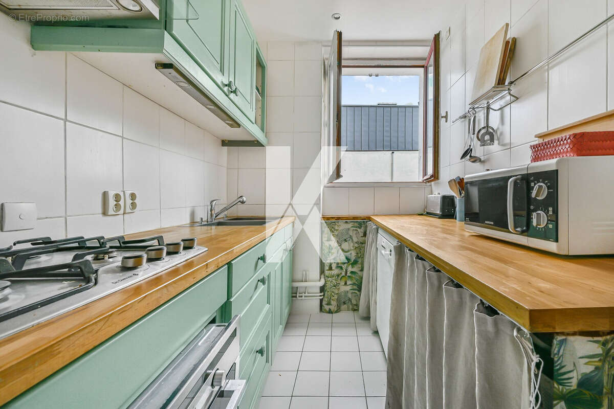 Cuisine séparée - Appartement à ASNIERES-SUR-SEINE
