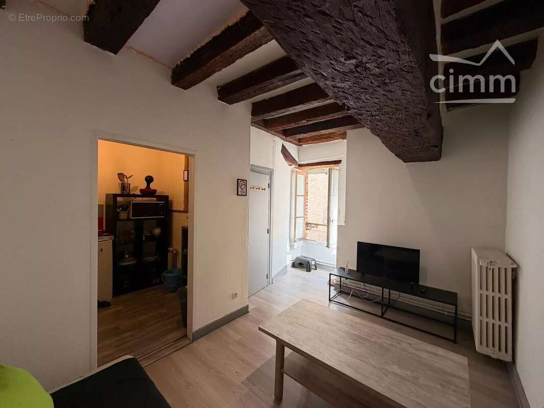 Immeuble de rapport avec local commercial loué et deux appartements - photo 6