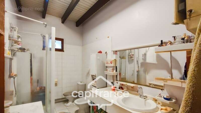 Maison de village louée - 8 pièces LAFITTE SUR LOT (47) - photo 3
