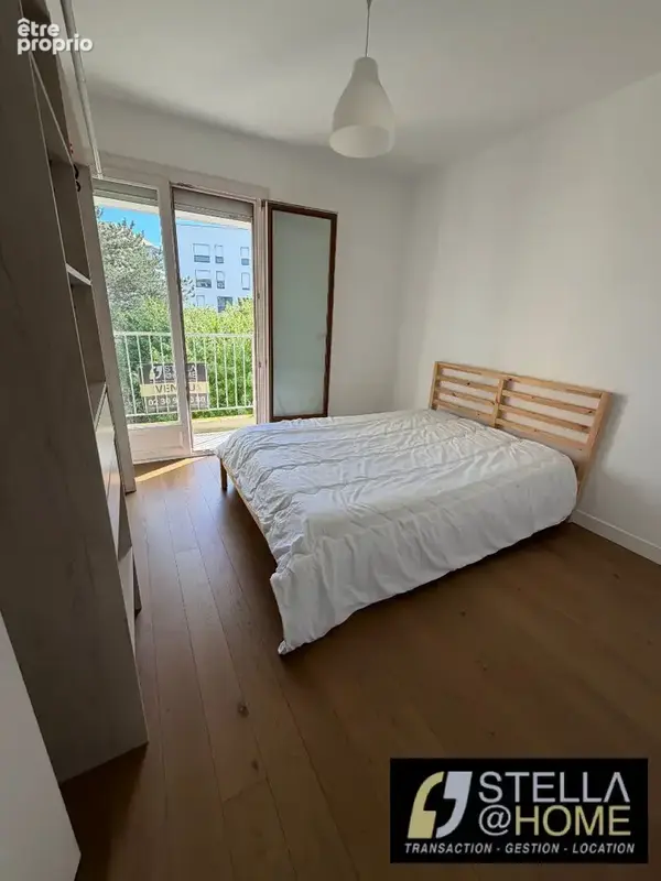 T2 traversant au sein d'une copropriété verdoyante - photo 2