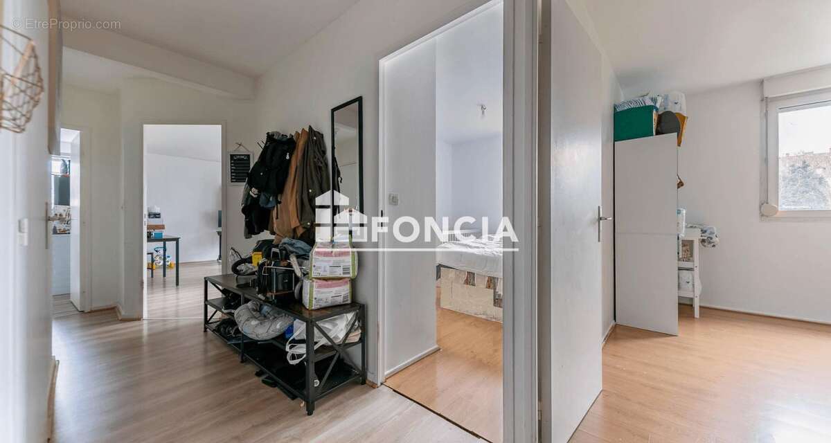 EXCLUSIVITE FONCIA -  Spacieux trois pièces avec balcon et parking intérieur - photo 4