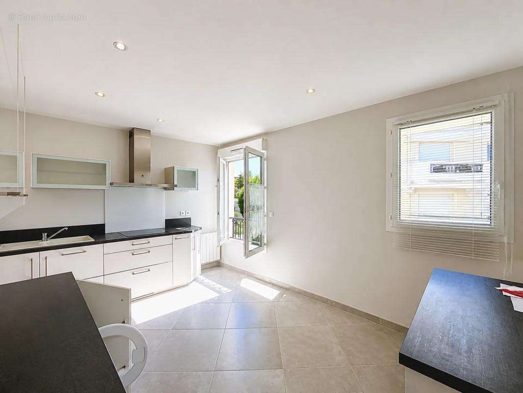 Appartement de 5 pièces de 95 m² à Osny - photo 3