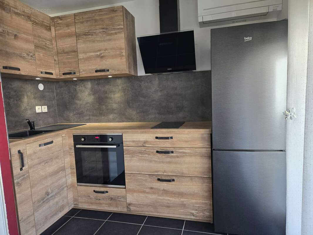 Appartement T2 avec terrasse et parking privatif - photo 3