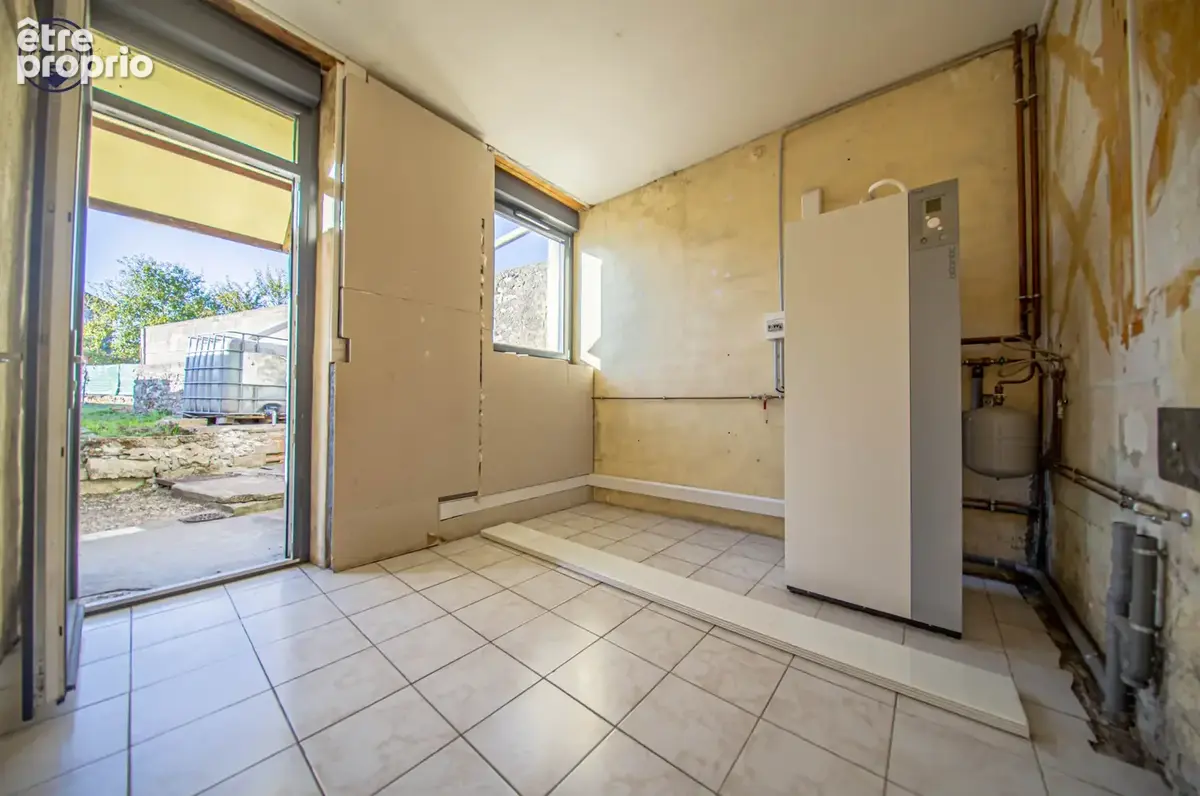 Maison comprenant deux lots avec garage - photo 9