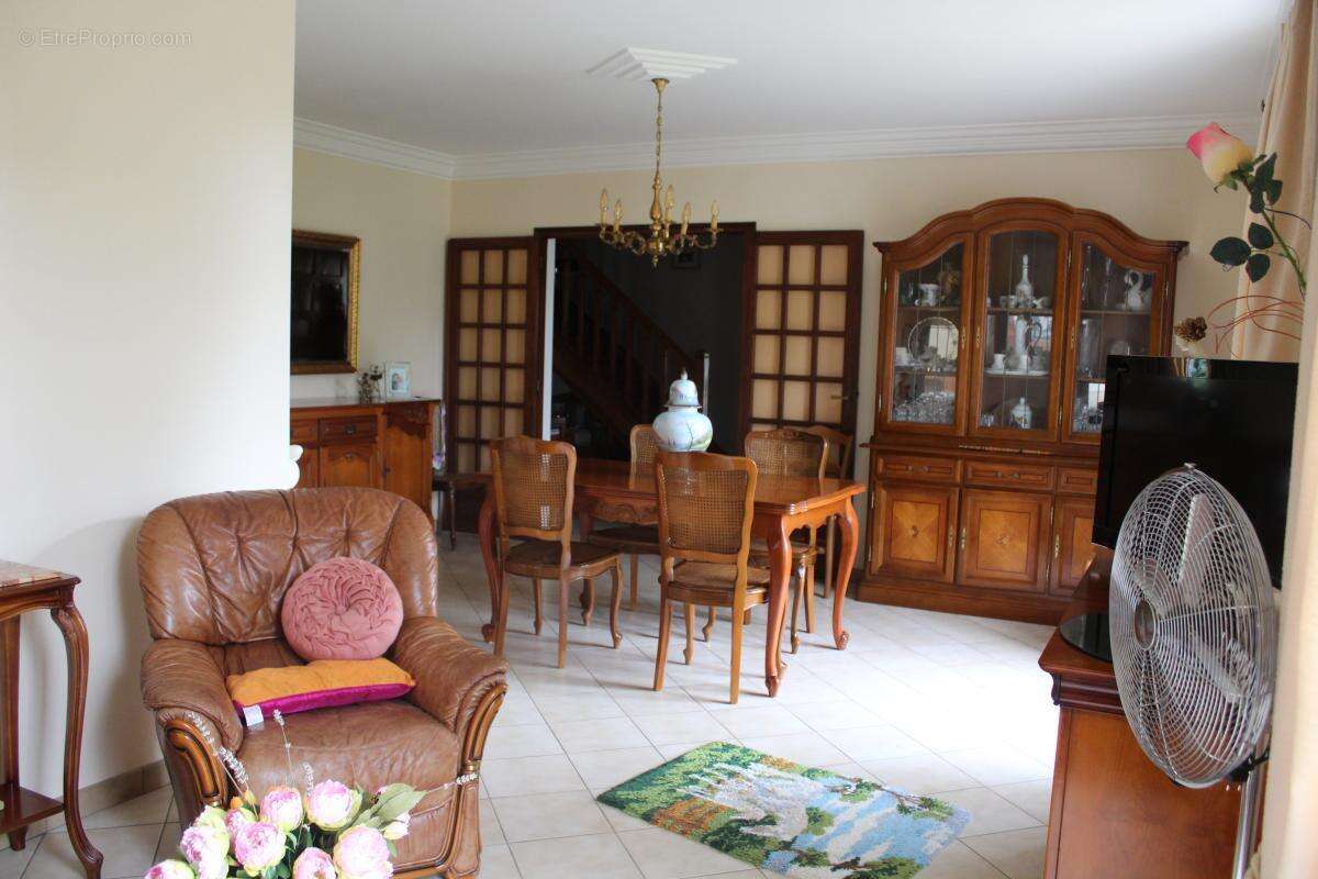 Maison sur deux niveaux avec sous sol - photo 3