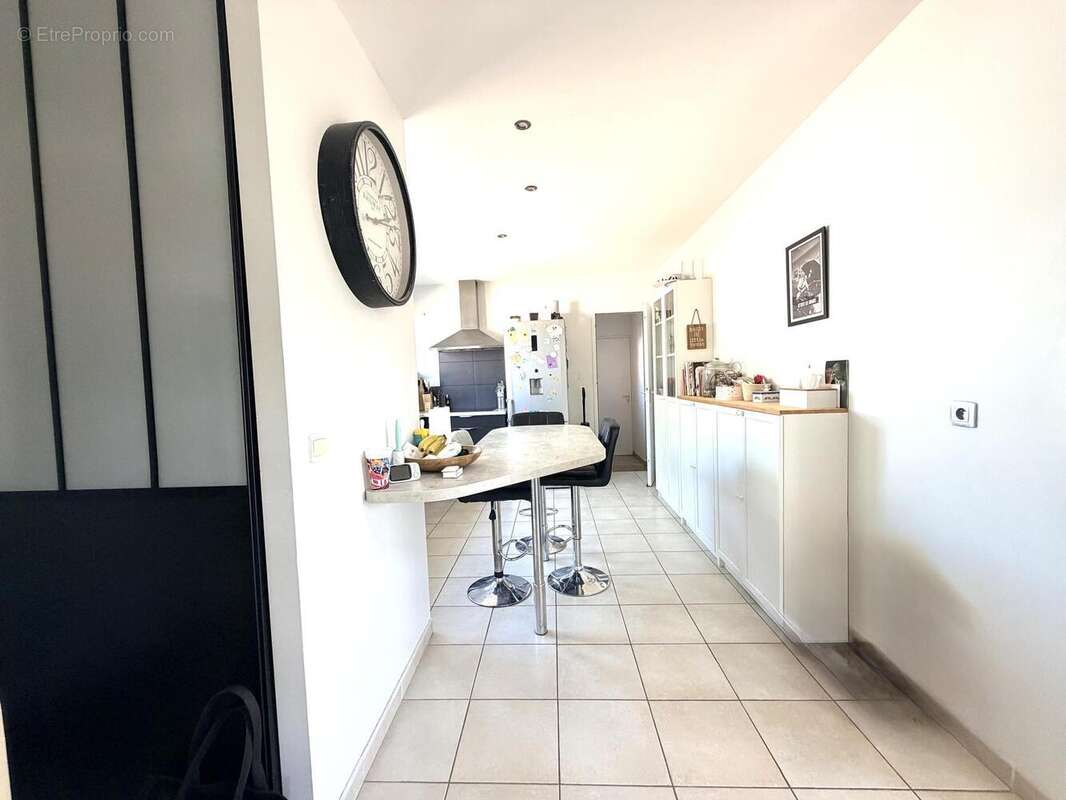 Maison 130 m² à Saint-Jean-De-Thurigneux  - photo 7