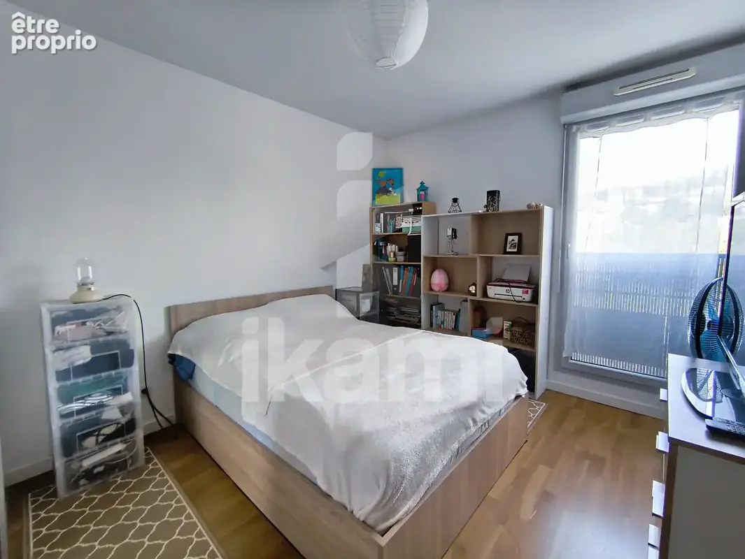 Appartement T2 avec ascenseur, balcon et place de parking dans résidence sécurisée à Montluel - photo 4