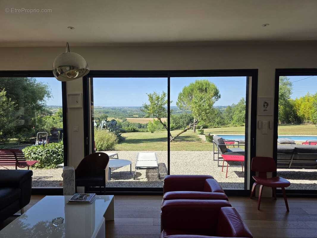 GERS—PROCHE CONDOM Maison en pierre rénovée avec vue exceptionnelle, piscine et garage - photo 4
