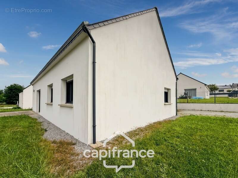 Maison à REGUINY