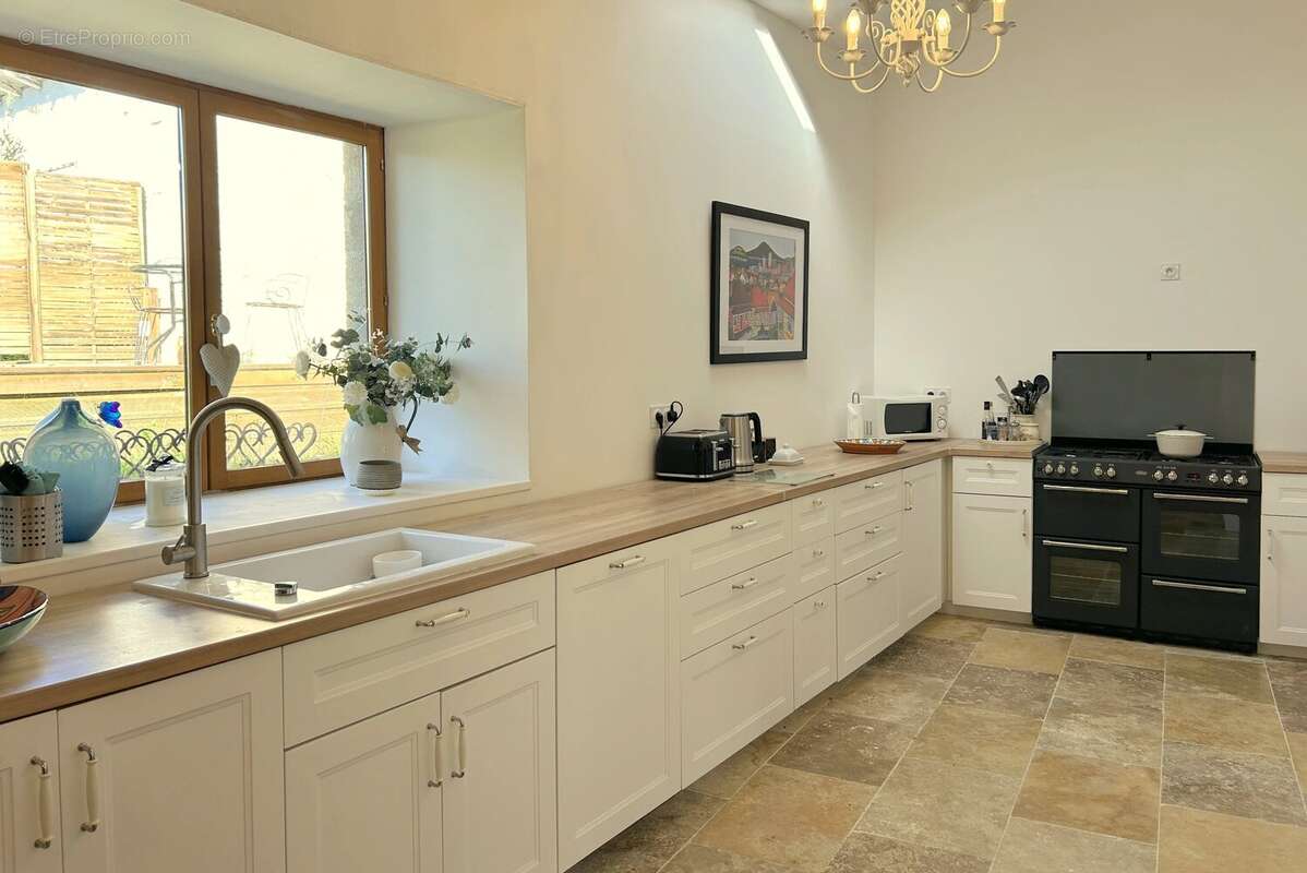 Maison de caractère rénovée de 3 à 4 chambres - photo 11