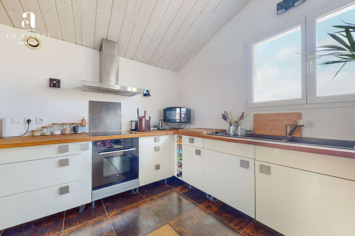 Appartement à SAINT-GENIS-LES-OLLIERES