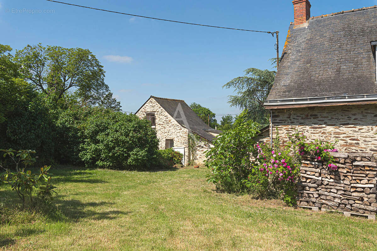 Maison de caractère à vendre à La Possonnière, implantée sur un magnifique terrain d'un hectare. - photo 14