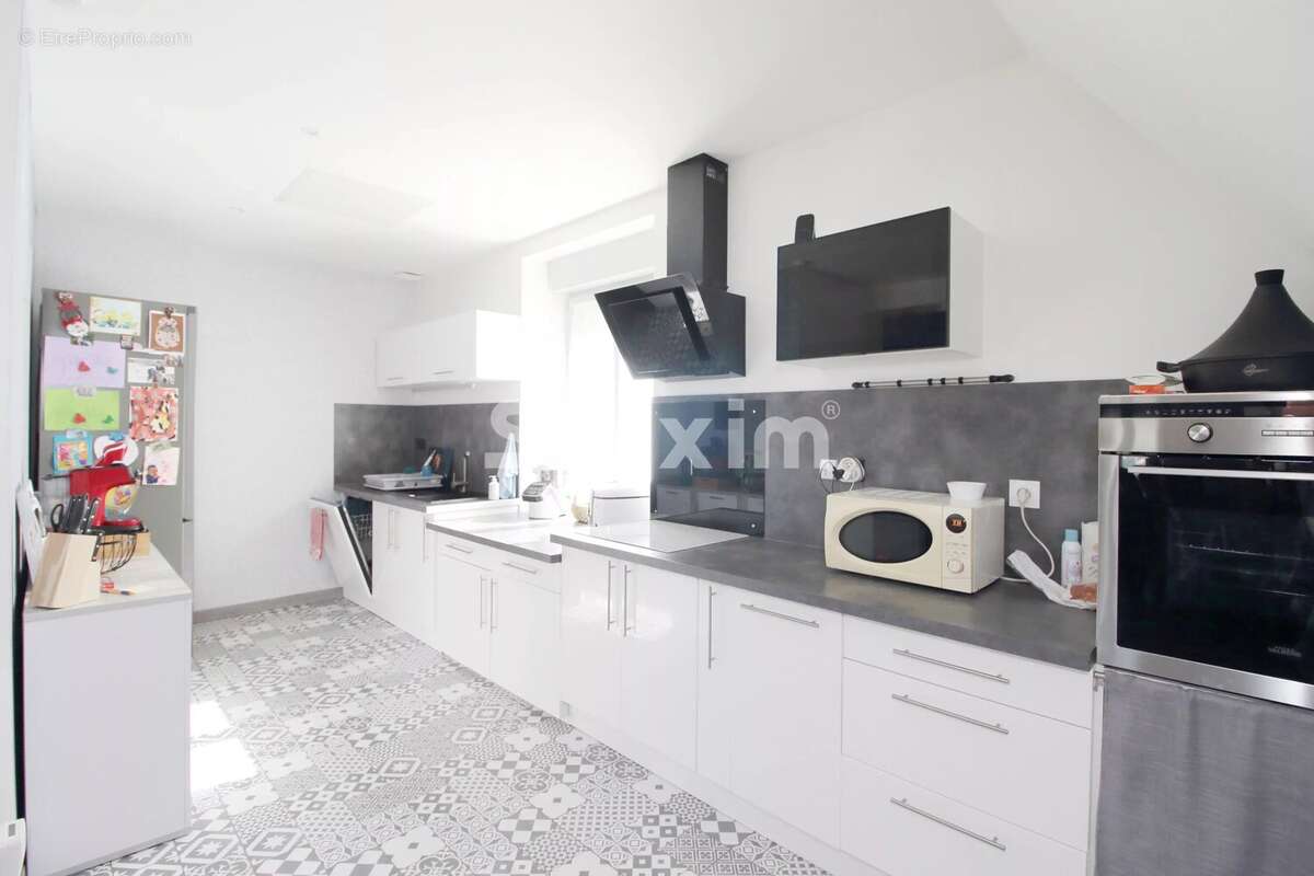 Appartement T5 avec garage, cave et grenier - photo 3