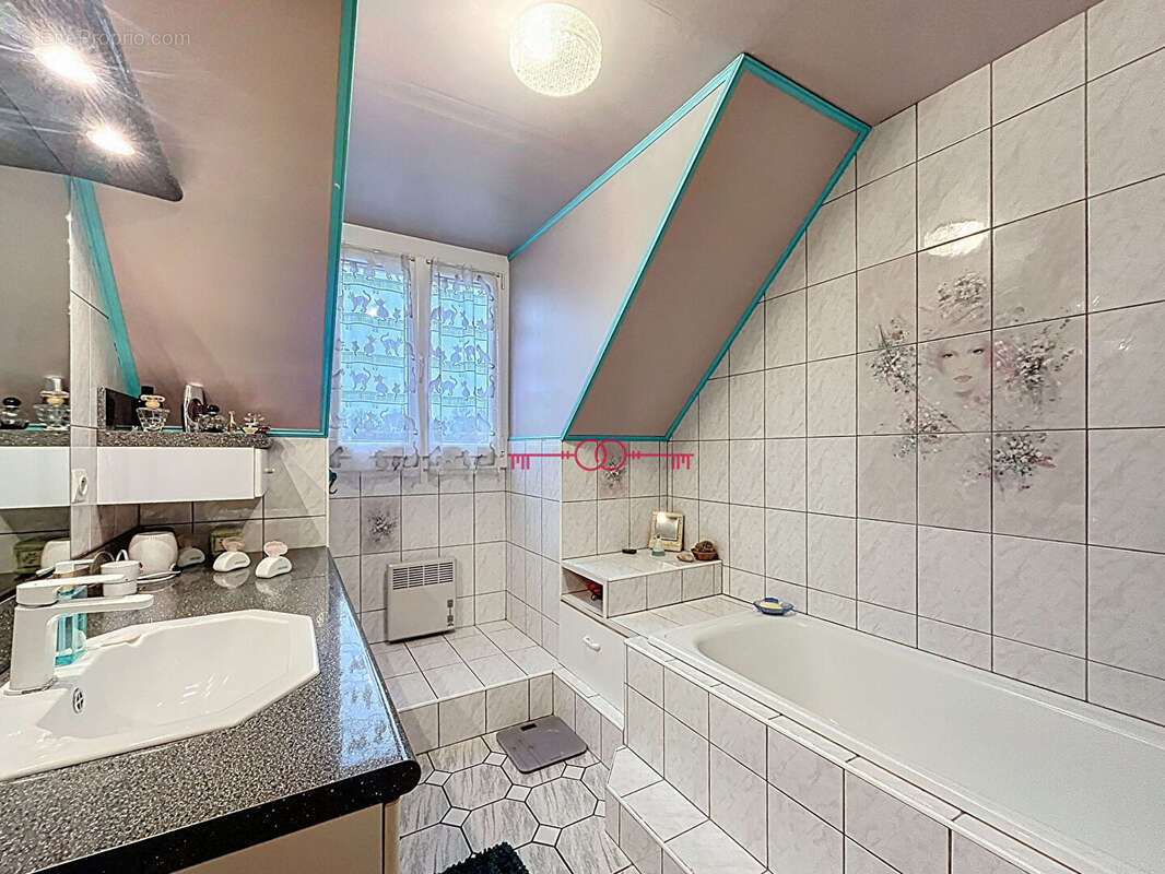 Taissy - Maison familiale avec sous-sol, dans un secteur calme - photo 7