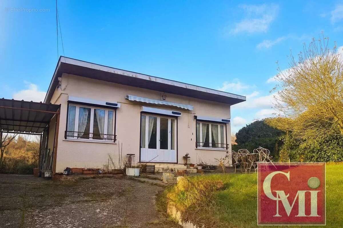 Maison de plain-pied (2 chambres) édifiée sur un terrain de - photo 2