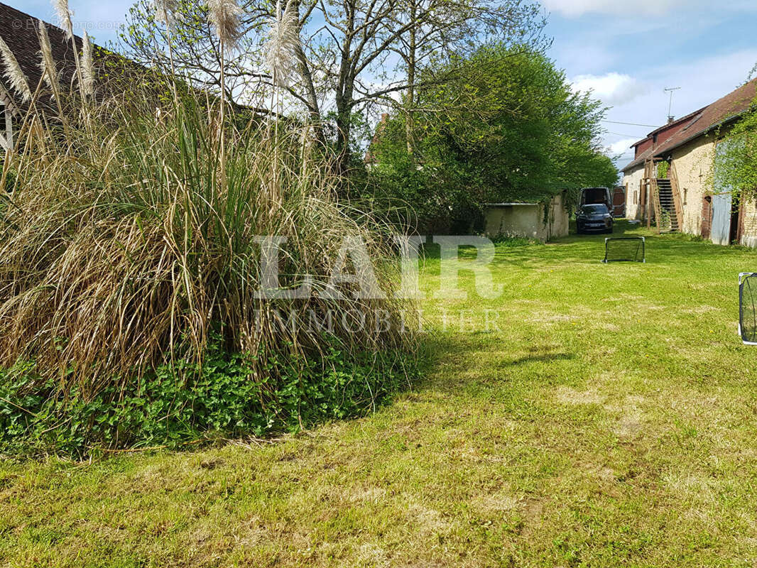 Maison à LE MENIL-GUYON