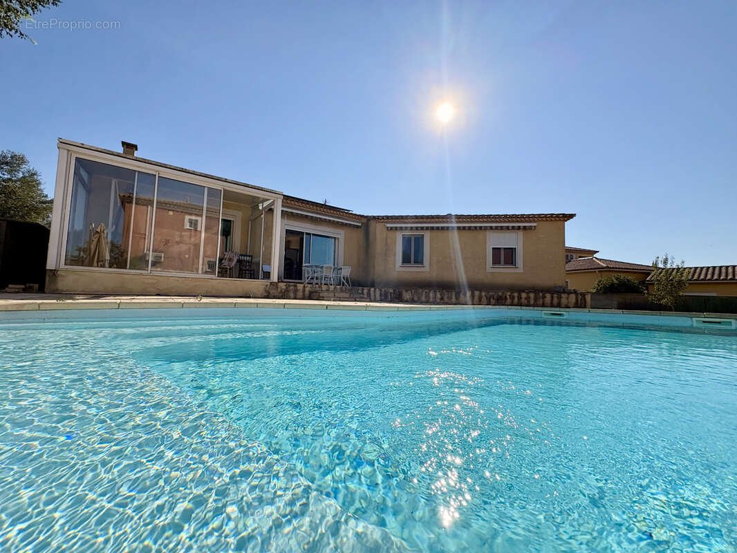 Maison plain pied 130m2 + double garage et piscine - UCHAUD - - photo 10