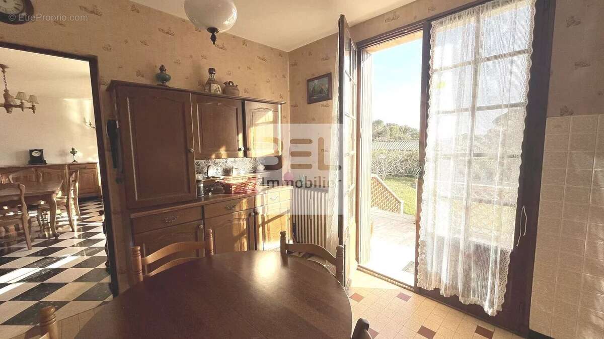 Maison à LAUDUN-L'ARDOISE