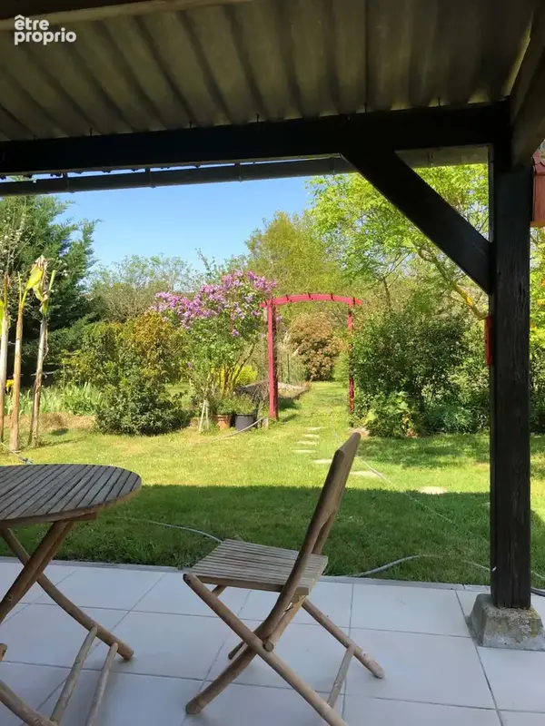 A VENDRE - Maison 4 pièces avec vie de plain-pied - garage/atelier de 90 m2 environ et jardin proche centre-vi - photo 4