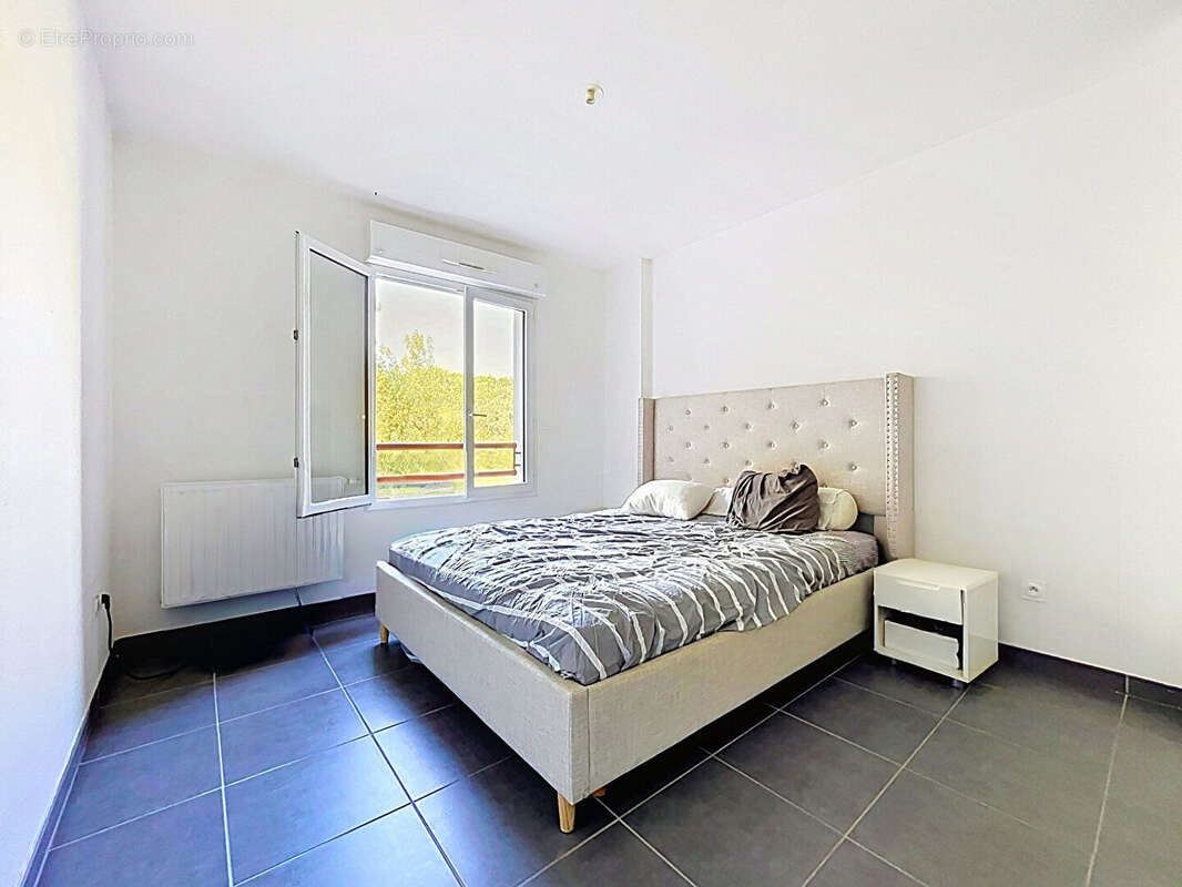 Juvignac - t2 loué - terrasse, vue garrigue et parking - investissement locatif - photo 4