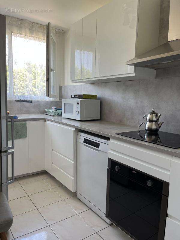 Appartement 3 pièces 58.61 m² - 2 chambres - parking - cave - VENDU LOUE - photo 2