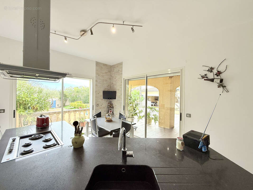 PIGNAN maison T6 avec piscine et sous sol - photo 4