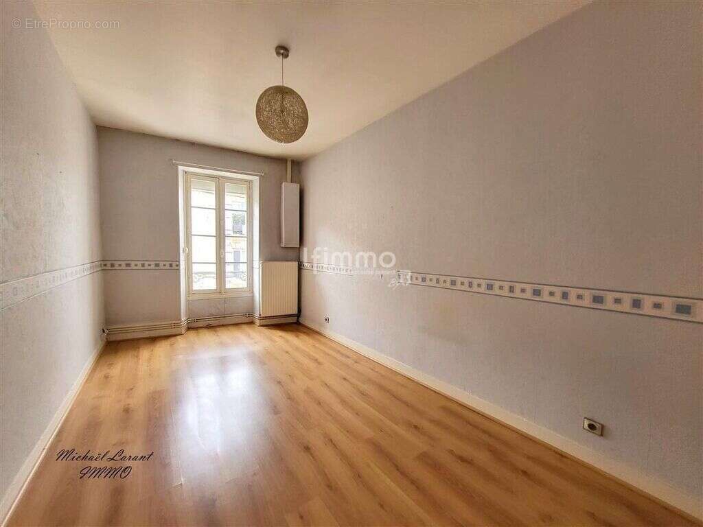 Appartement, terrain et local commercial - photo 2
