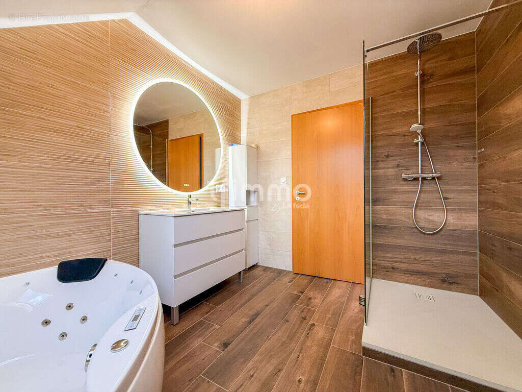Maison bi-famille de 155m² sur 6,70 ares en quartier résidentiel - photo 9