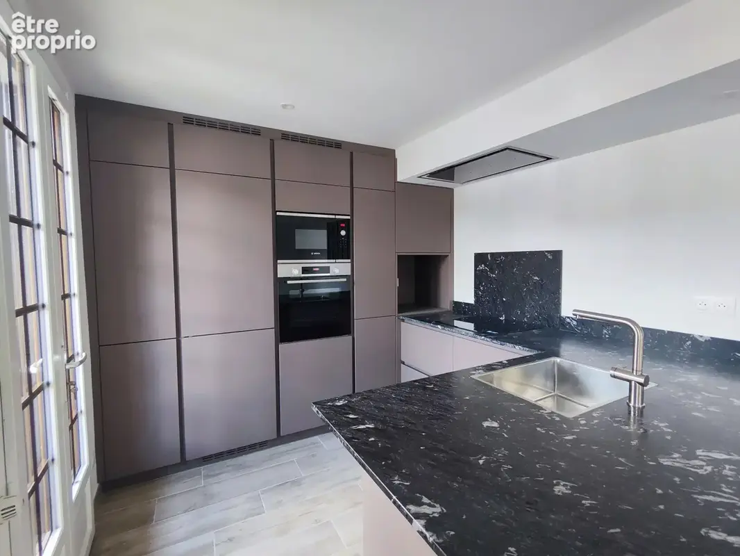 Belle maison de ville avec balcons - photo 6