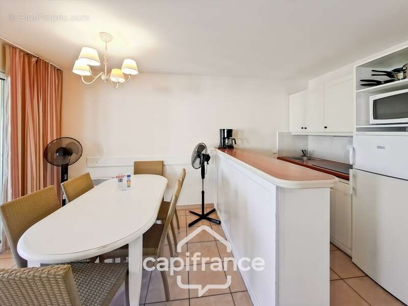 Investissement locatif appartement 3 pieces 42 m2 en angle   au 1er étage place de parking  sur le domaine de pont royal - photo 11