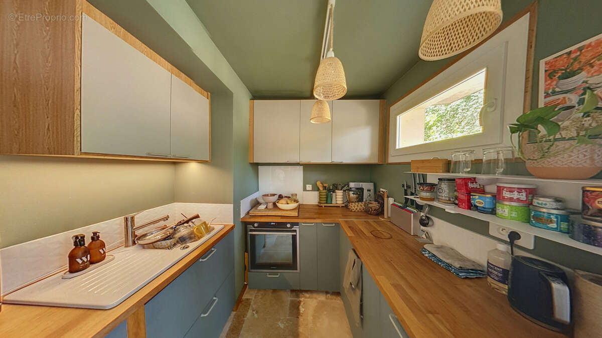 maison de 100m2 et 300m2 de terrain - photo 4