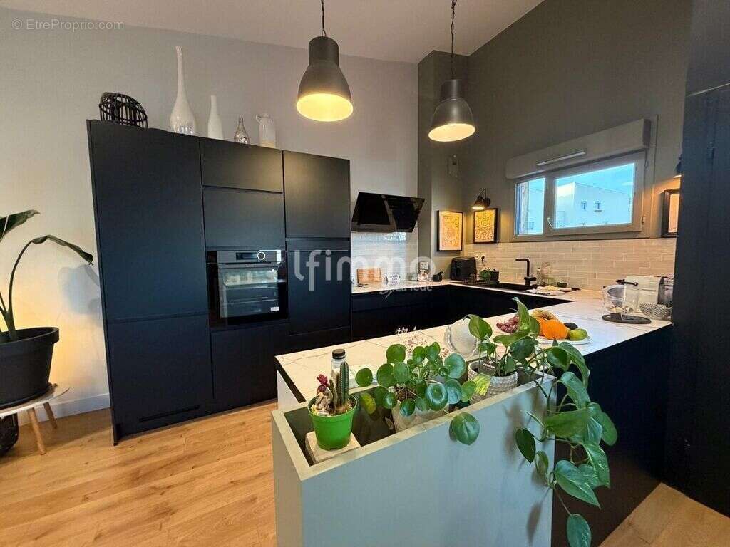 Appartement T4 duplex 2 terrasses de 37 m² et garage fermé - photo 3