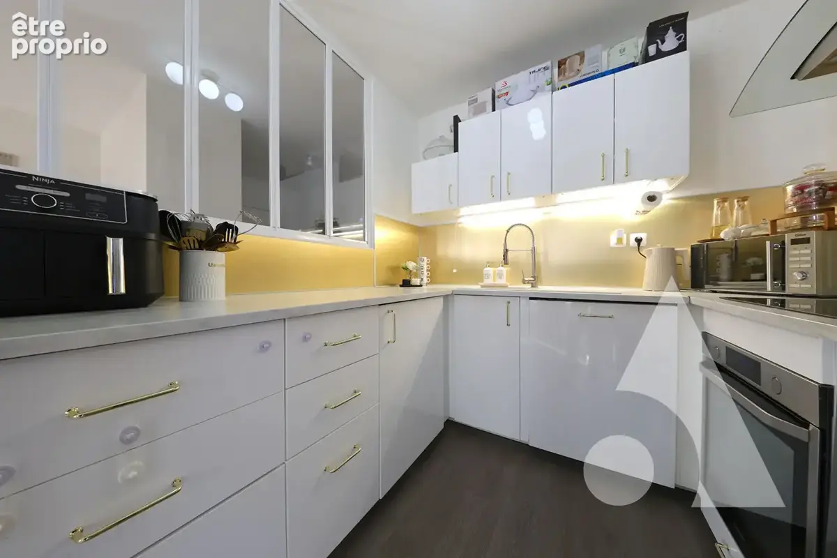 F4 avec 3 chambres, terrasse et parking privé - photo 4